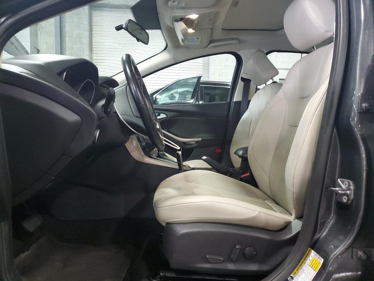 2017 Ford Focus Titanium VIN: 1FADP3J25HL272056 Lot: 81080585