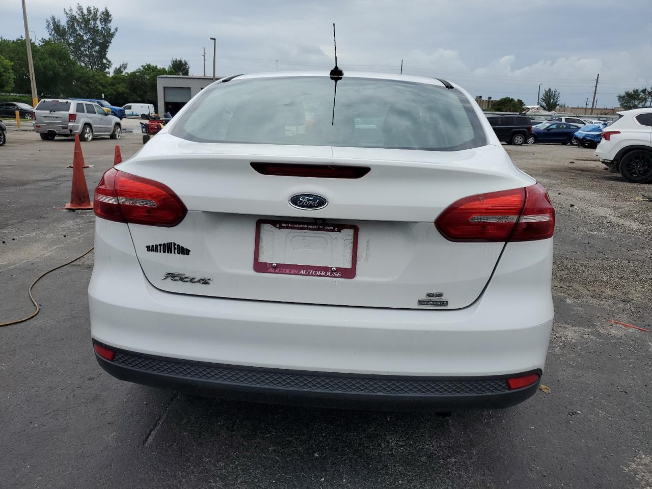 2016 Ford Focus Se VIN: 1FADP3FE6GL371308 Lot: 80610375