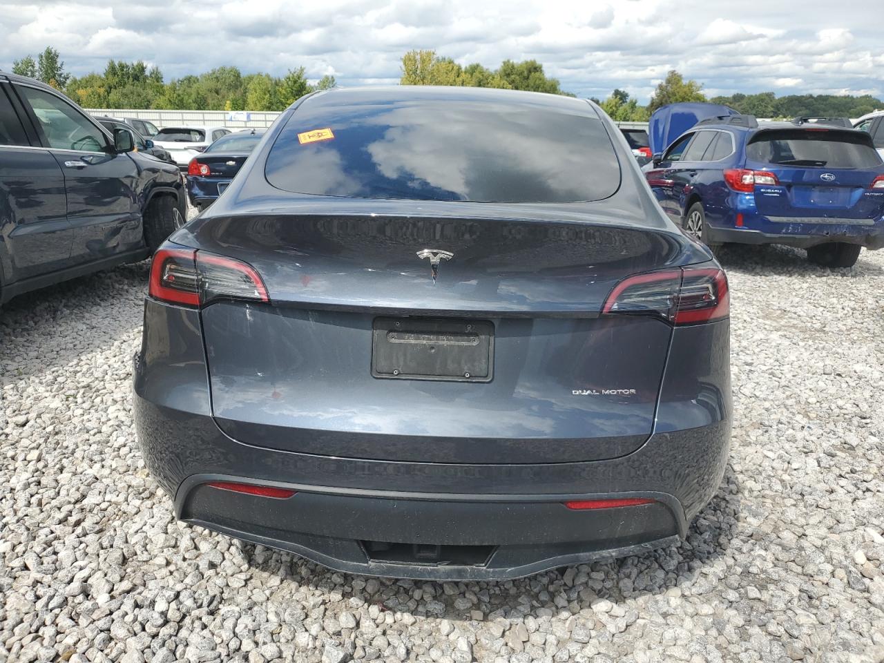 2023 Tesla Model Y VIN: 7SAYGAEE8PF830989 Lot: 69842555