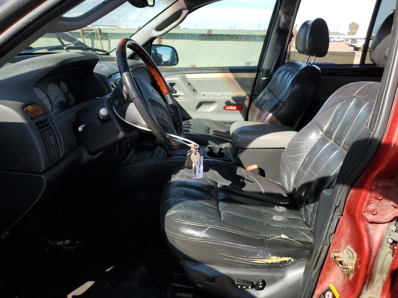 2002 Jeep Grand Cherokee Overland VIN: 1J8GW68J02C141531 Lot: 81875595