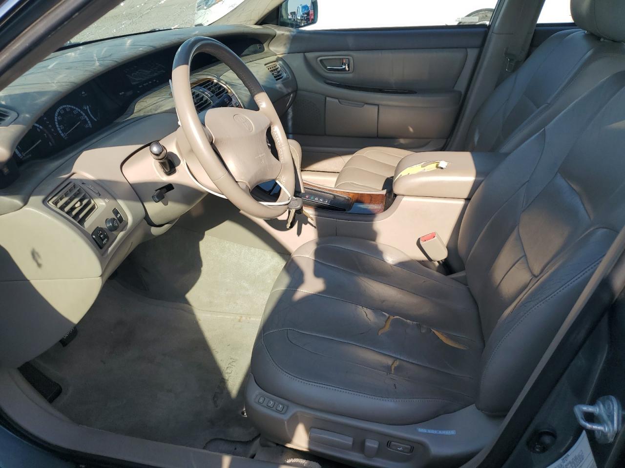 2000 Toyota Avalon Xl VIN: 4T1BF28B7YU027558 Lot: 81485115