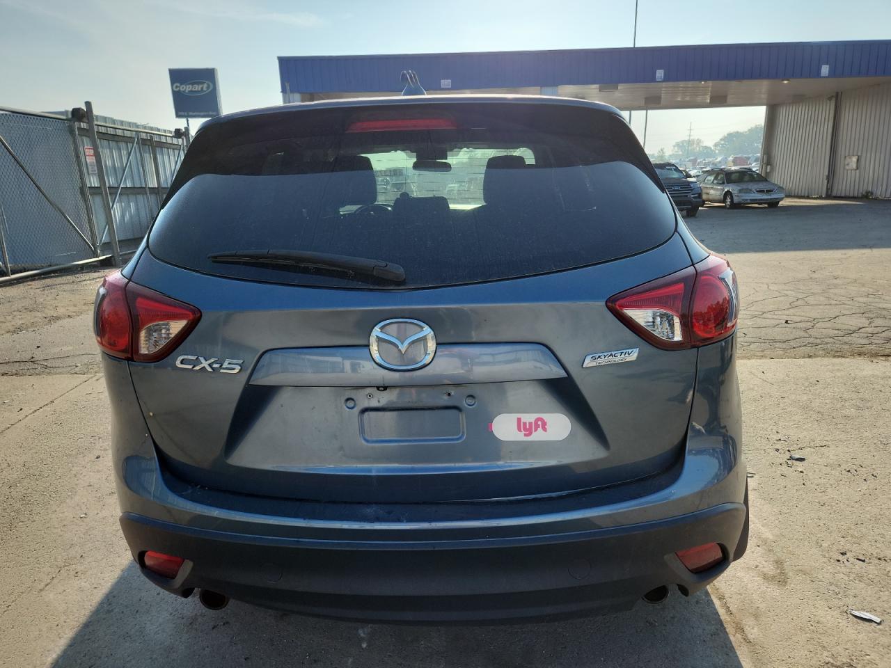 2014 Mazda Cx-5 Touring VIN: JM3KE2CY9E0411564 Lot: 81373875