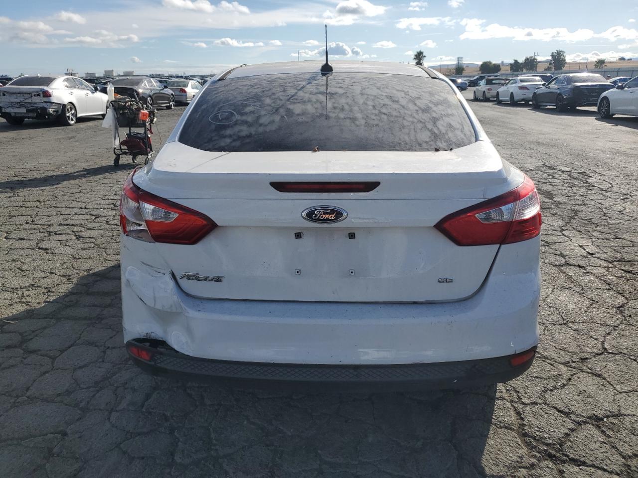 2014 Ford Focus Se VIN: 1FADP3F24EL312051 Lot: 84259915