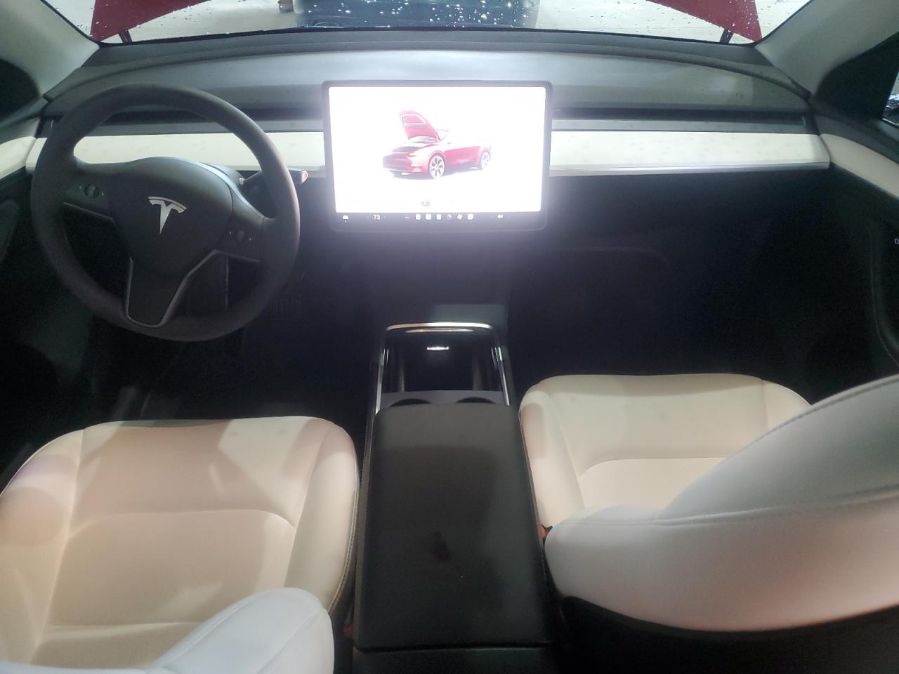 2025 Tesla Model Y VIN: 7SAYGDED5SA377316 Lot: 82024825