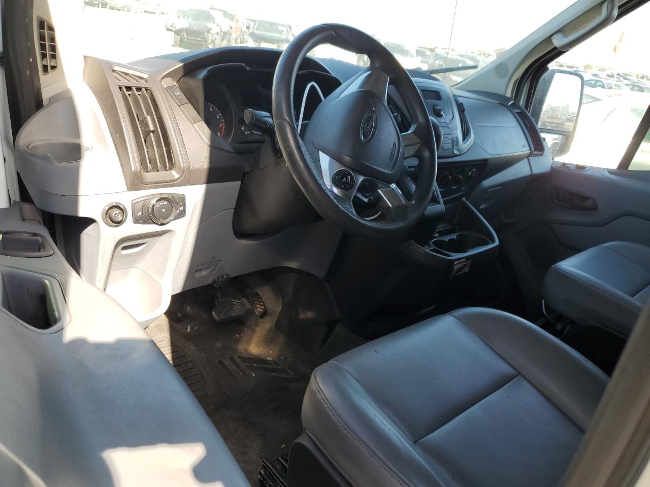 2015 Ford Transit T-150 VIN: 1FTNE2CM2FKA49764 Lot: 71306575