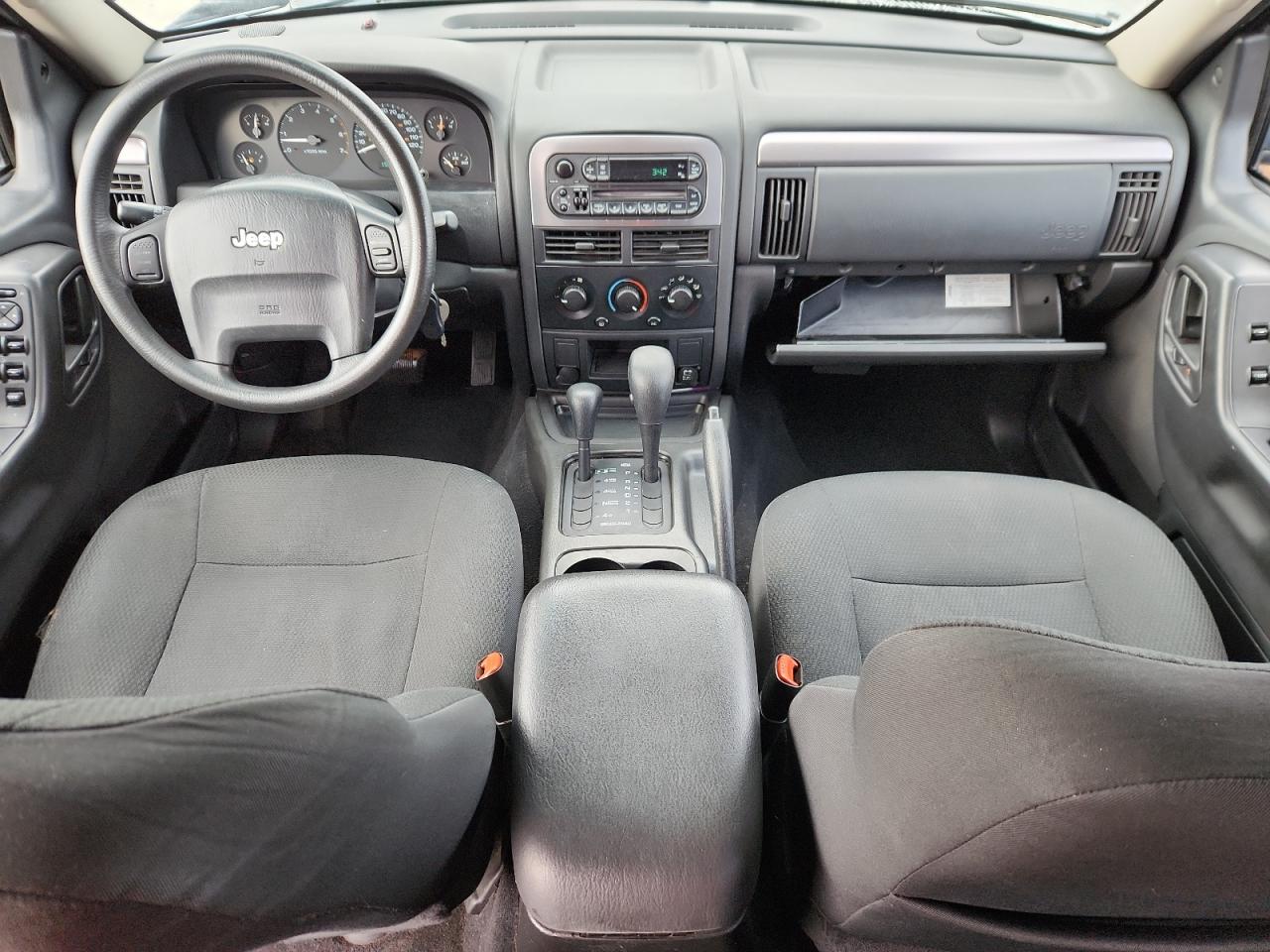 2003 Jeep Grand Cherokee Laredo VIN: 1J4GW48N03C570923 Lot: 82103275