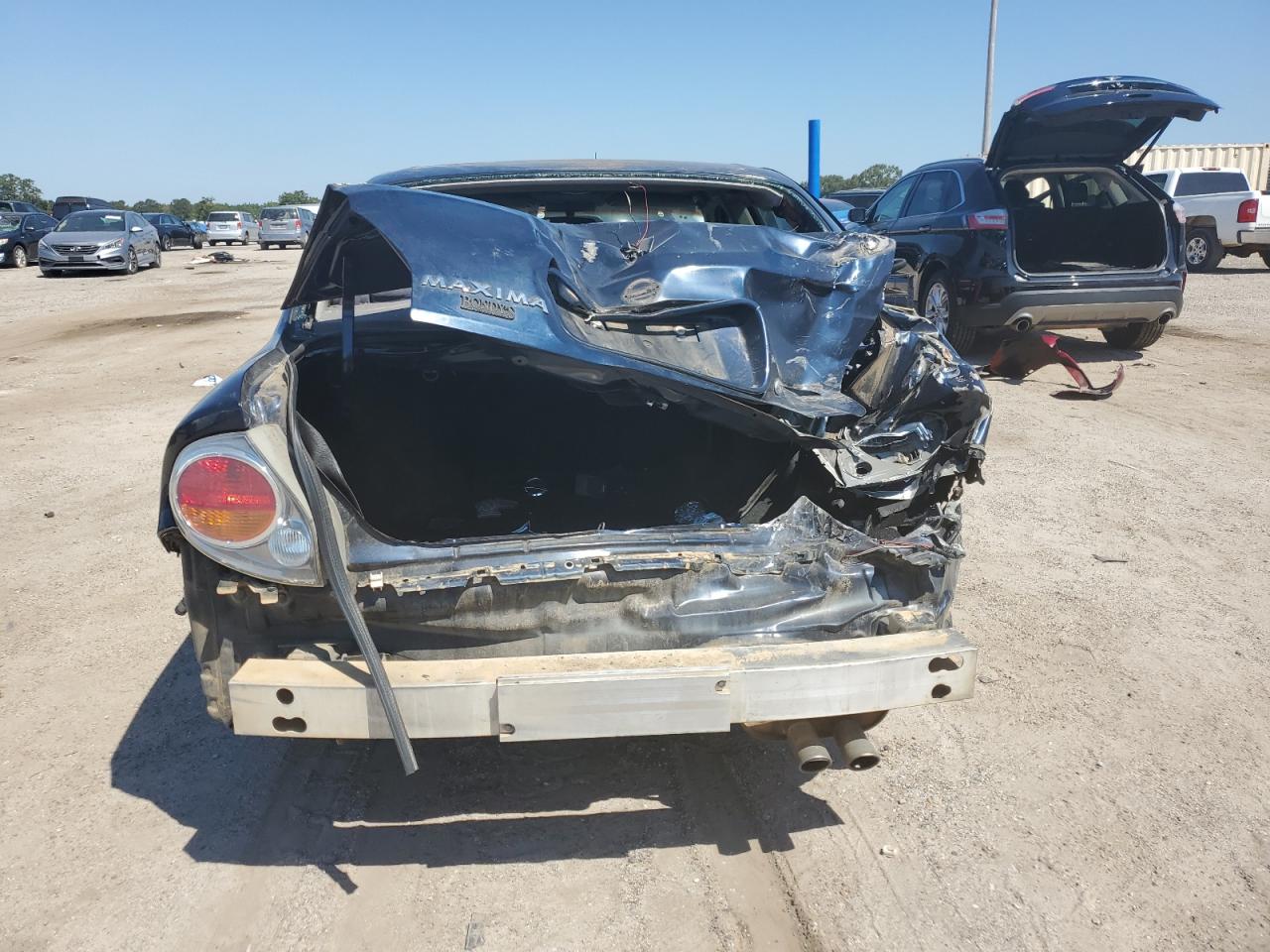 2002 Nissan Maxima Gle VIN: JN1DA31D72T424975 Lot: 71999165