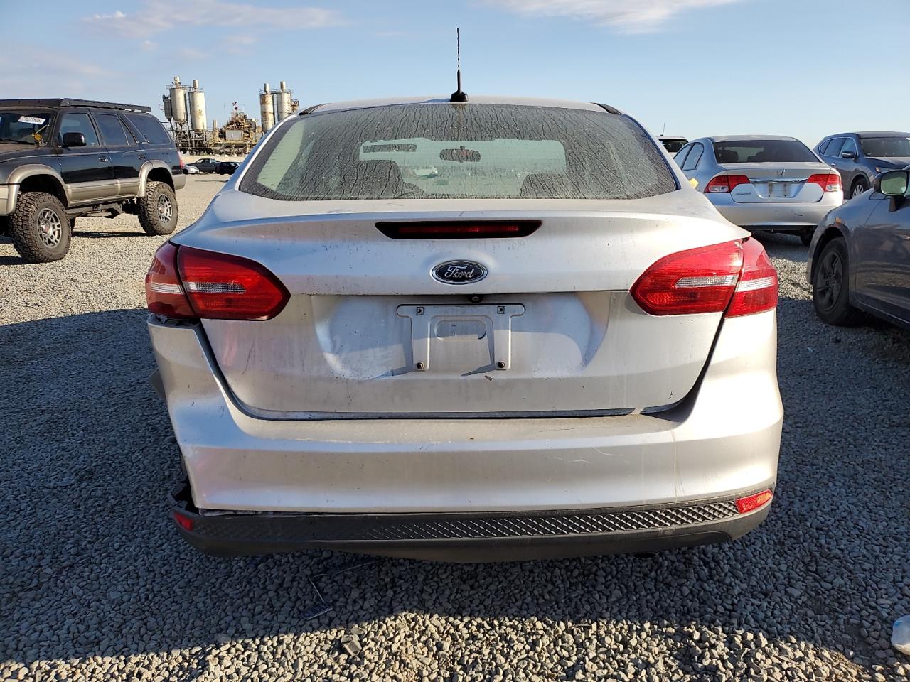 2016 Ford Focus S VIN: 1FADP3E29GL395660 Lot: 70709995