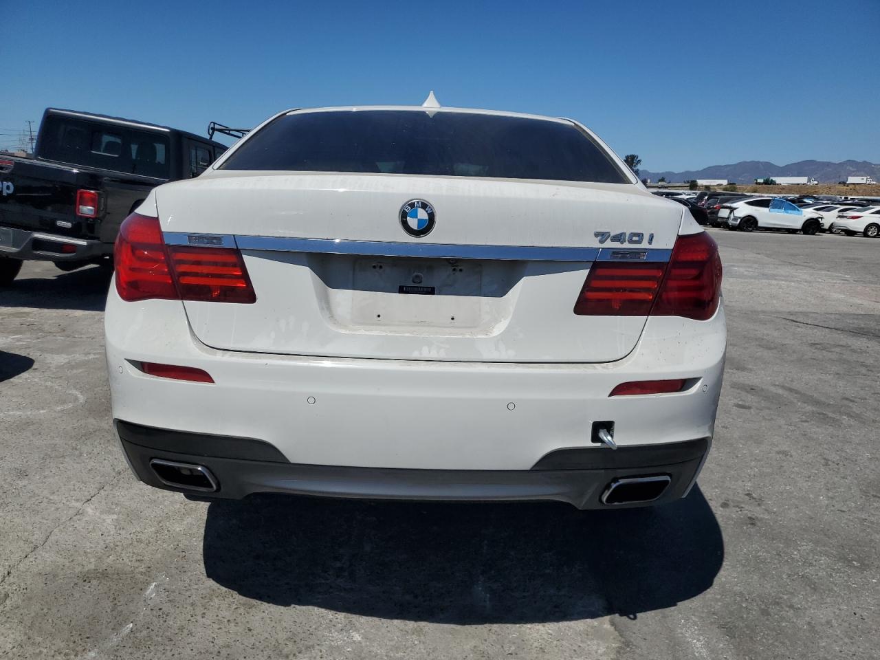 2015 BMW 740 I VIN: WBAYA6C54FD826908 Lot: 71930275