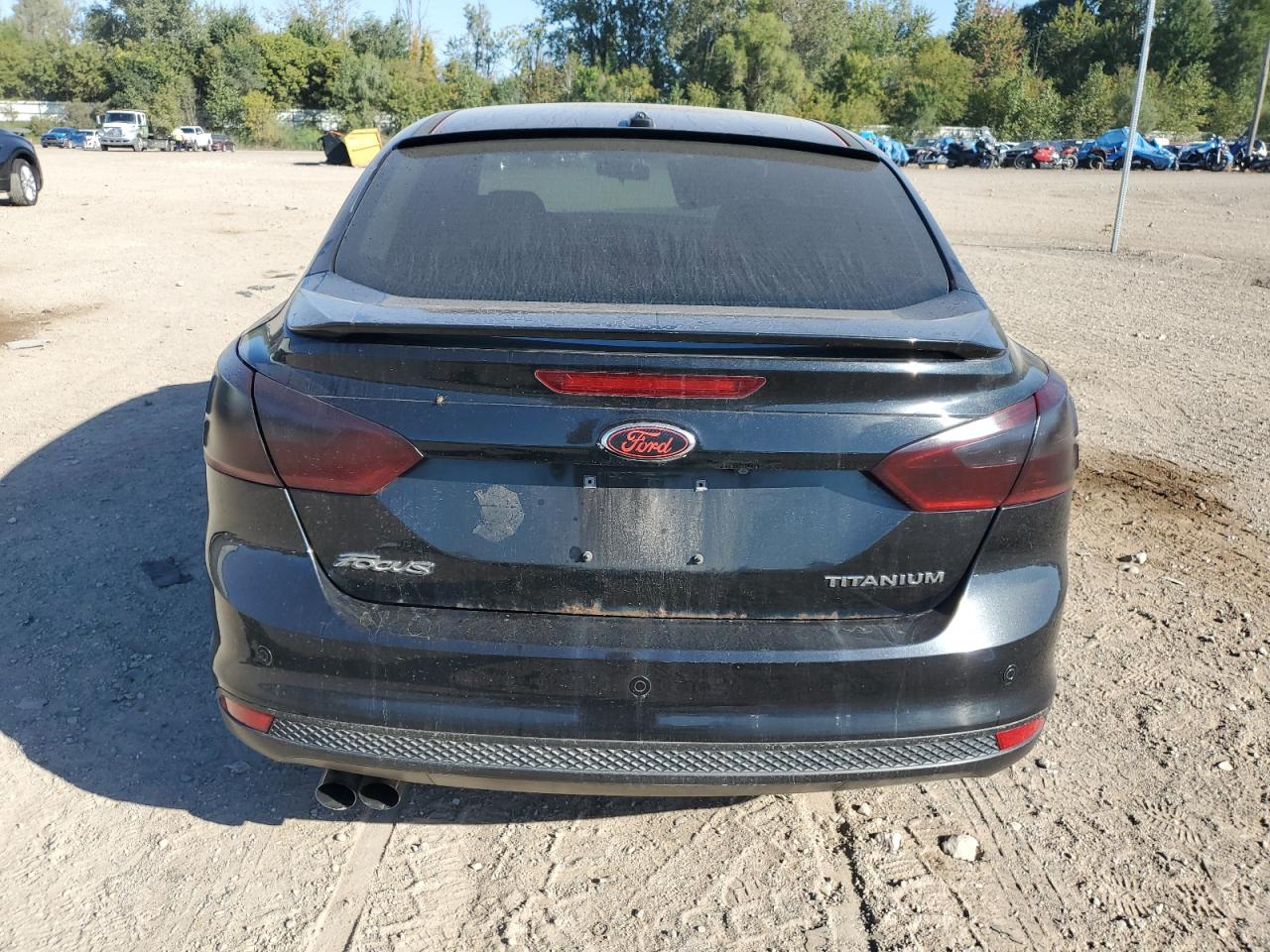2014 Ford Focus Titanium VIN: 1FADP3J20EL253412 Lot: 83834645