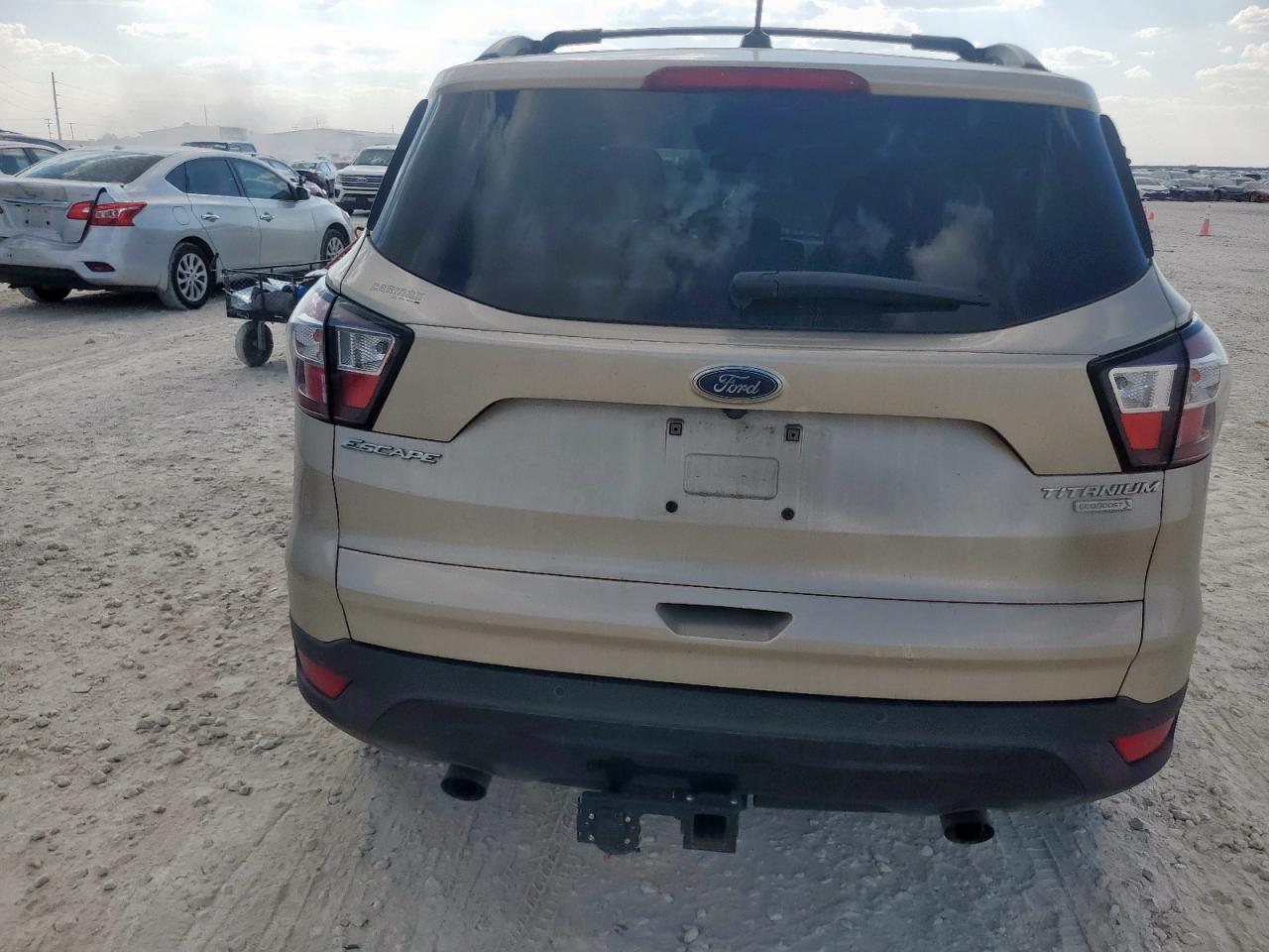 2017 Ford Escape Titanium VIN: 1FMCU0J97HUD53026 Lot: 84757865