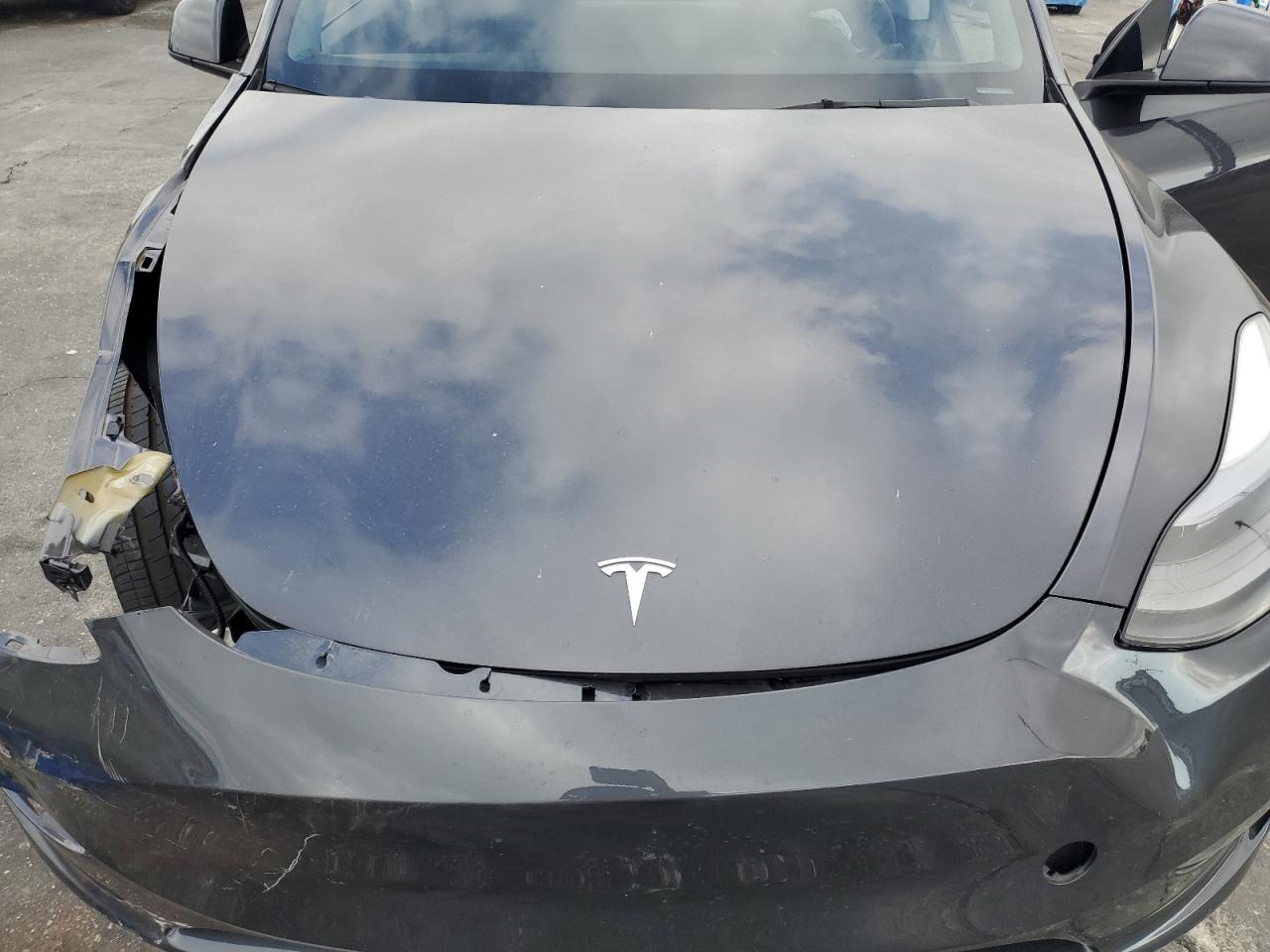 2024 Tesla Model Y VIN: 7SAYGDED3RF096533 Lot: 84296075