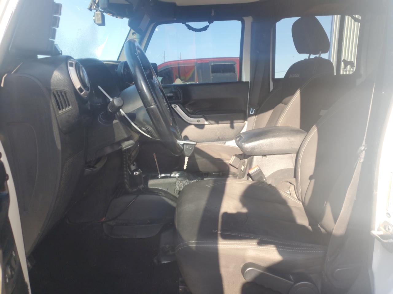 2016 Jeep Wrangler Unlimited Sahara VIN: 1C4BJWEG2GL304390 Lot: 72016345