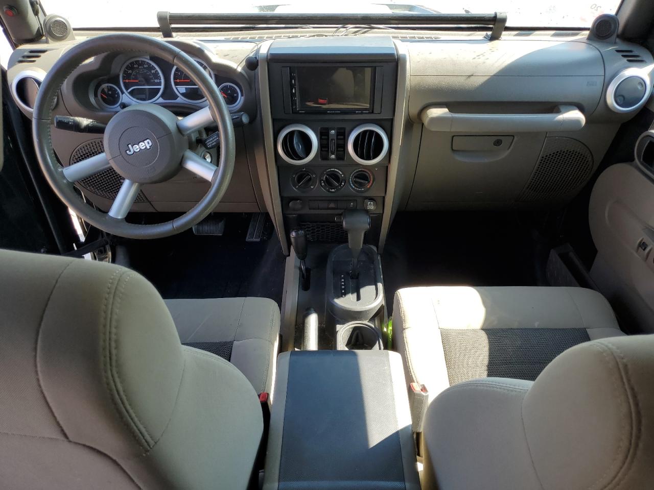 2010 Jeep Wrangler Unlimited Sahara VIN: 1J4BA5H1XAL125839 Lot: 80084415