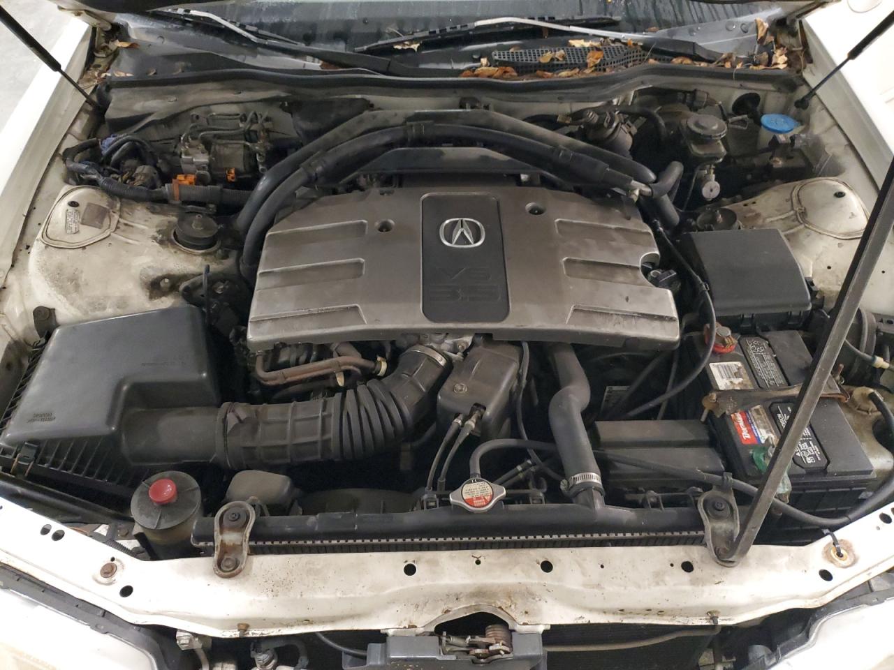 1998 Acura 3.5Rl VIN: JH4KA9640WC012384 Lot: 84588355