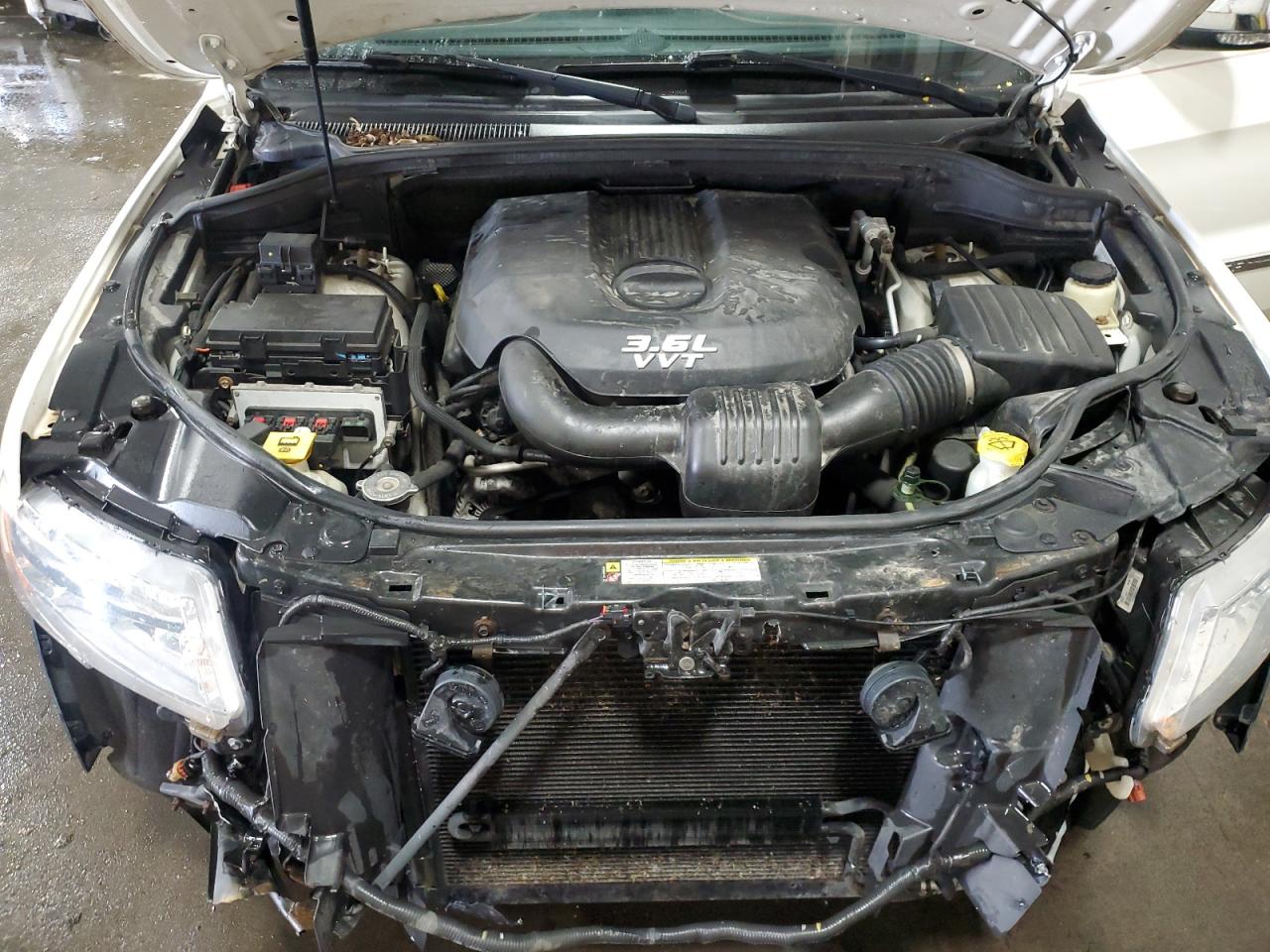 2012 Jeep Grand Cherokee Overland VIN: 1C4RJFCG7CC324310 Lot: 84262345