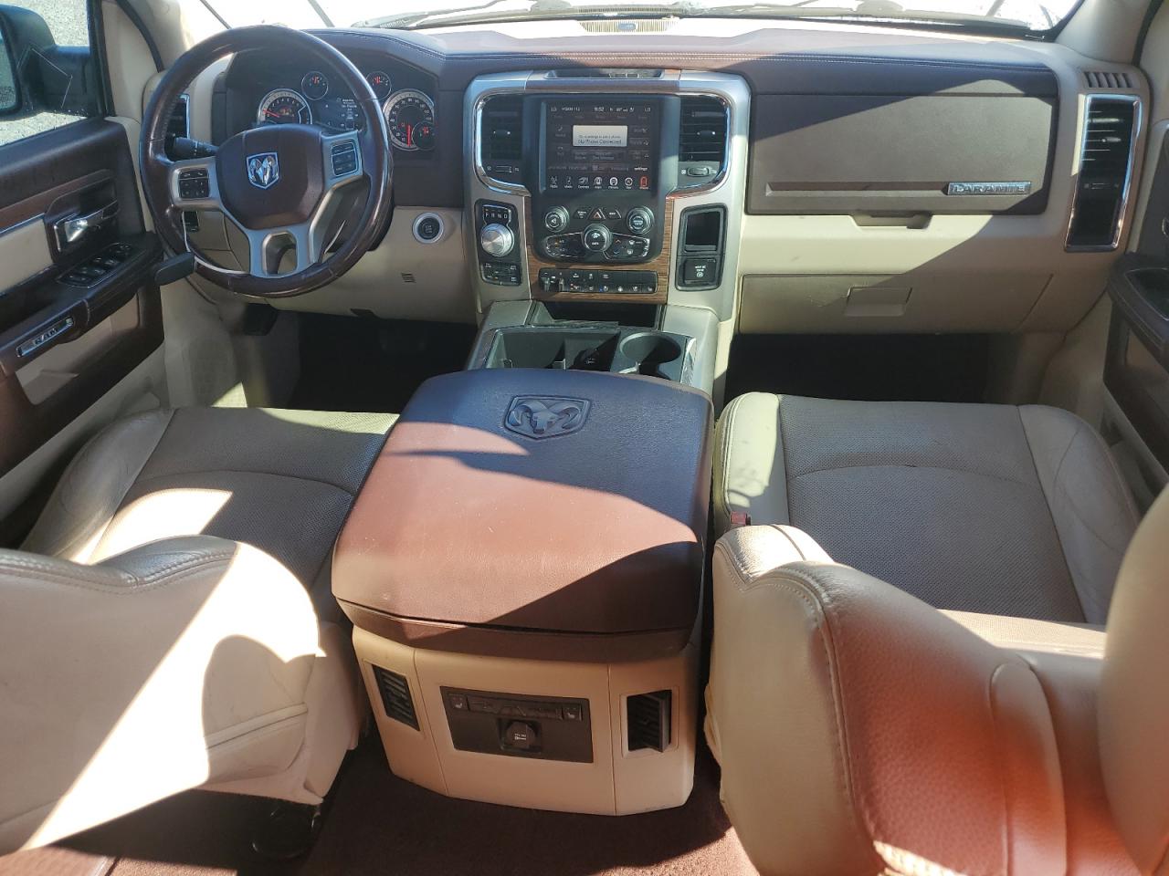 2014 Ram 1500 Laramie VIN: 1C6RR7NT0ES282779 Lot: 83848485