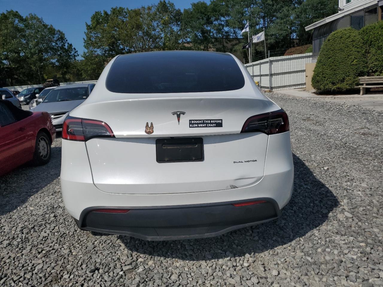 2023 Tesla Model Y VIN: 7SAYGDEE6PA097596 Lot: 84426775