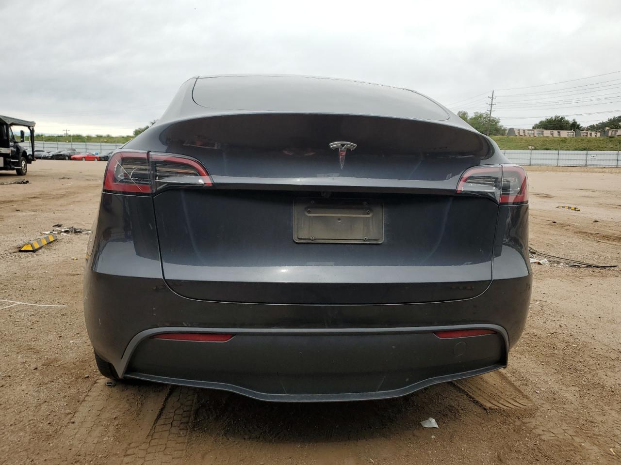 2025 Tesla Model Y VIN: 7SAYGDED3SF228549 Lot: 81584725