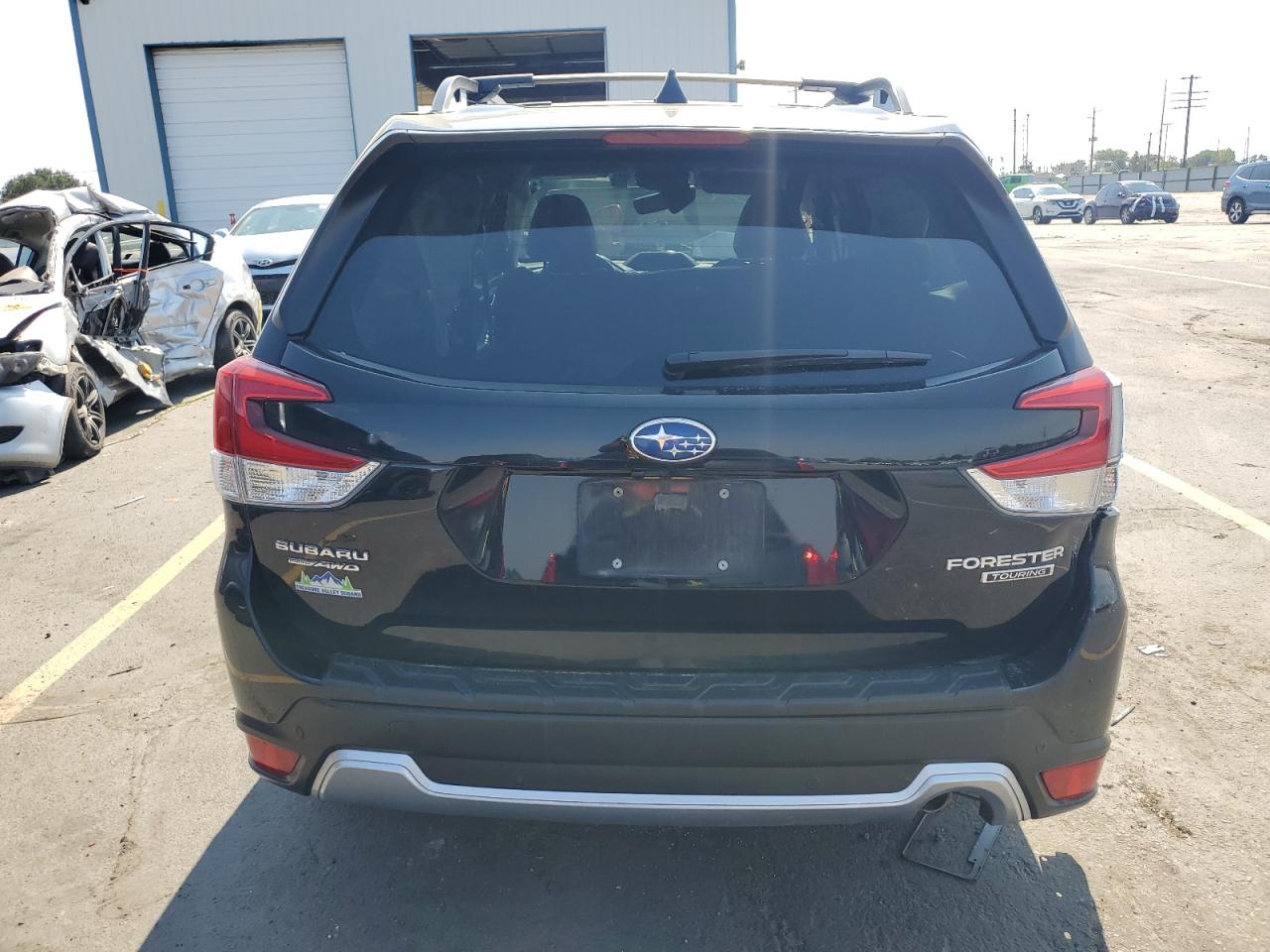 2021 Subaru Forester Touring VIN: JF2SKAXC7MH408285 Lot: 71227975