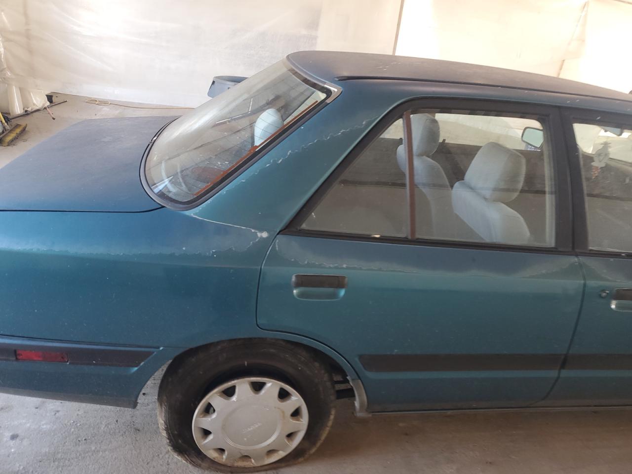 1994 Mazda Protege Dx VIN: JM1BG2248R0778768 Lot: 82029965