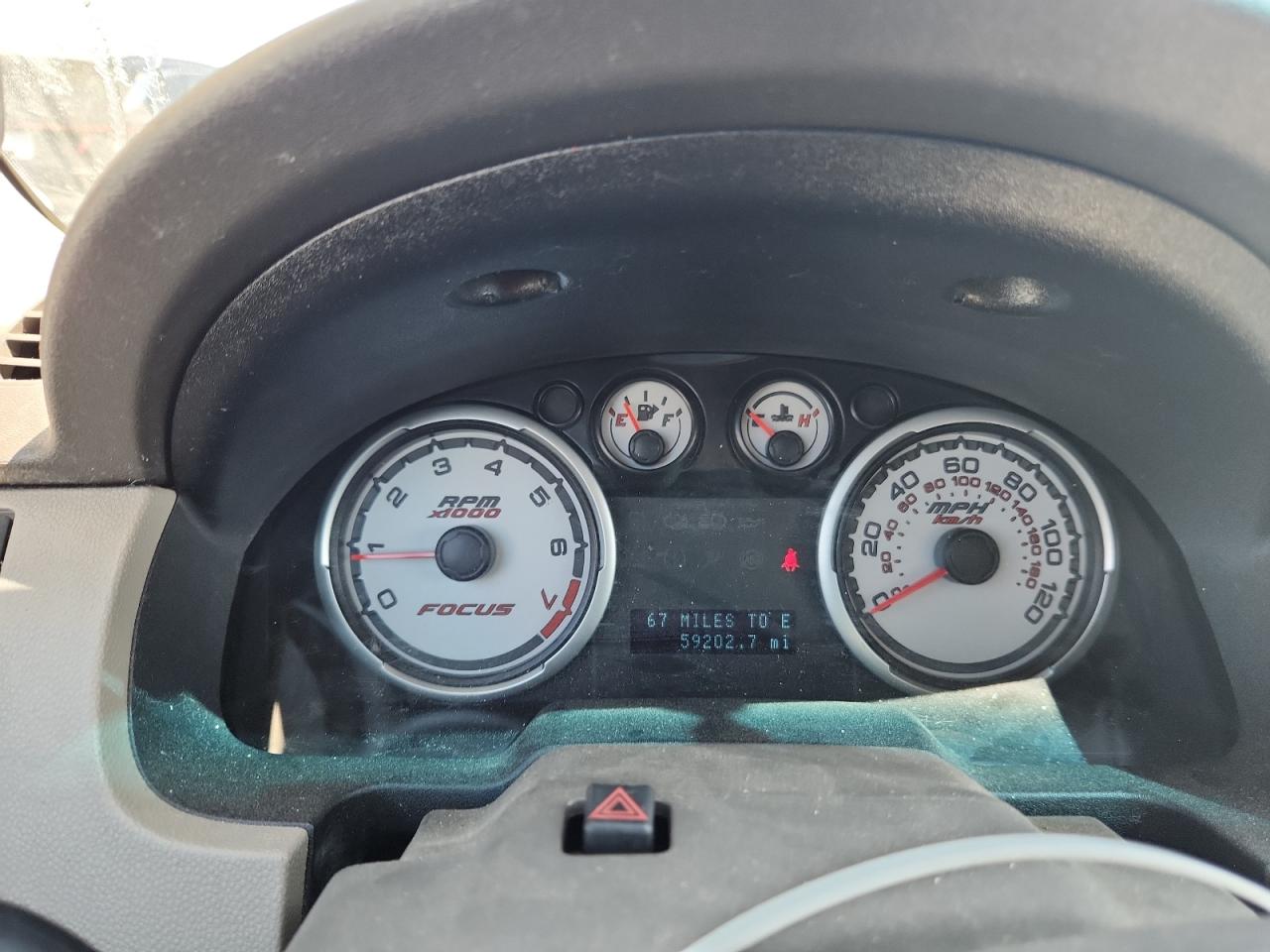 2009 Ford Focus Se VIN: 1FAHP32N79W147215 Lot: 84410725