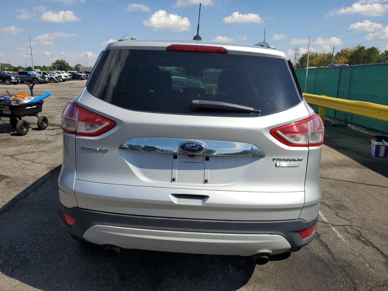 2014 Ford Escape Titanium VIN: 1FMCU0J9XEUB10080 Lot: 81797745