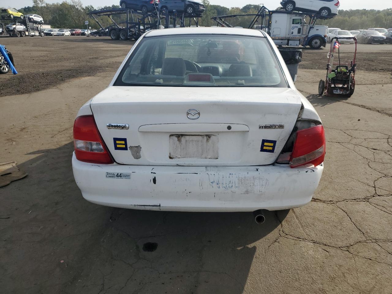 2000 Mazda Protege Dx VIN: JM1BJ222XY0308482 Lot: 84620975