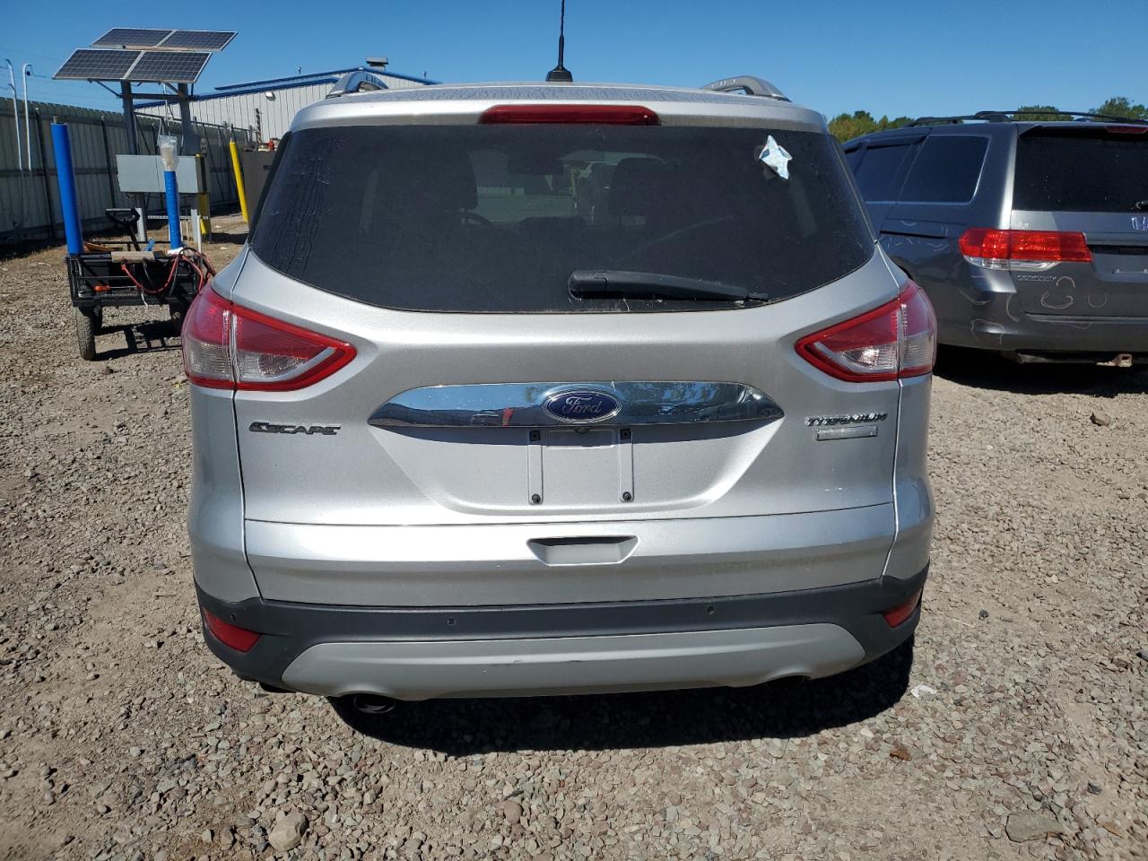 2016 Ford Escape Titanium VIN: 1FMCU0JX2GUC07761 Lot: 80719255
