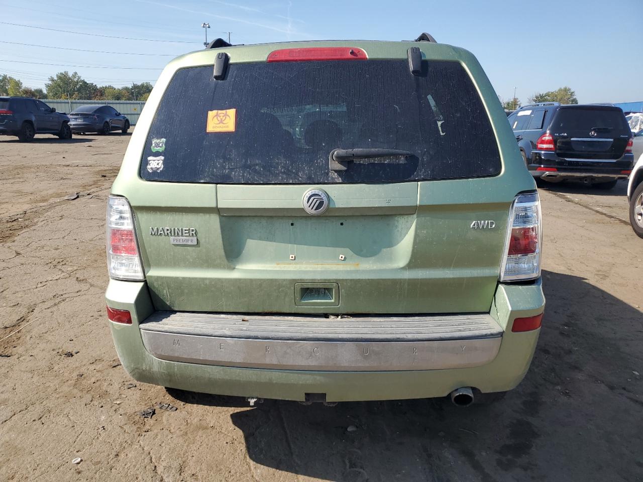 2009 Mercury Mariner Premier VIN: 4M2CU97G89KJ02103 Lot: 80701245