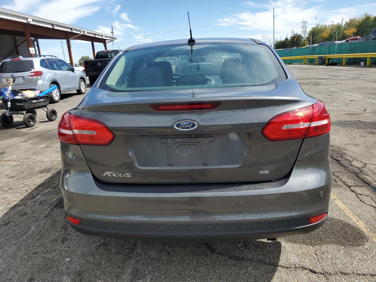 2016 Ford Focus Se VIN: 1FADP3F21GL323558 Lot: 84638085