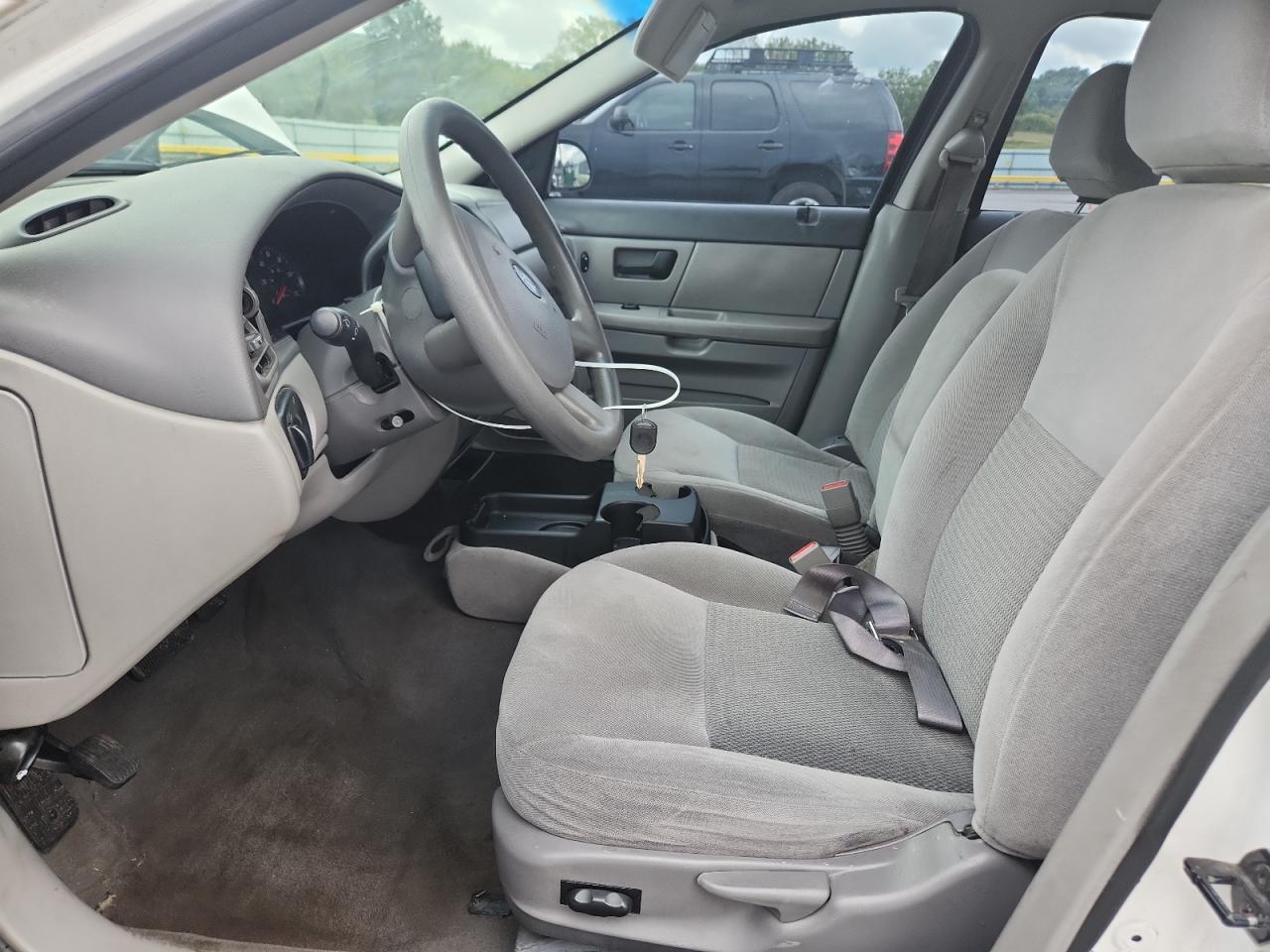 2005 Ford Taurus Se VIN: 1FAFP53215A244179 Lot: 82070545