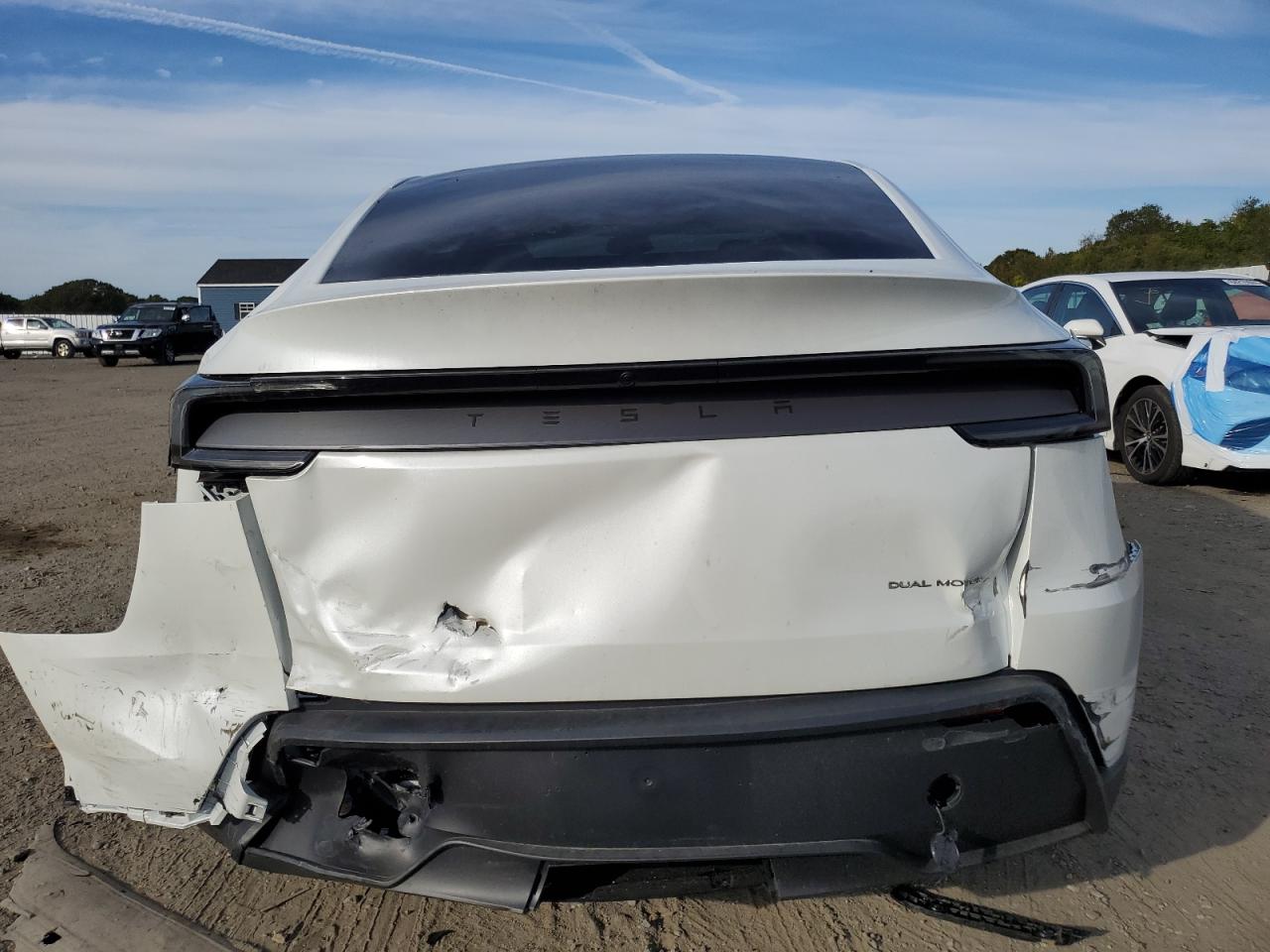 2026 Tesla Model Y VIN: 7SAYGDEE5TF410036 Lot: 84451435