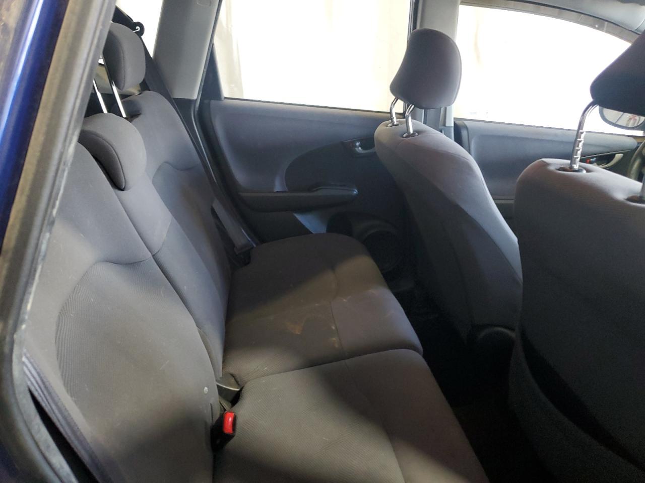 2009 Honda Fit VIN: JHMGE88279S031542 Lot: 82099005