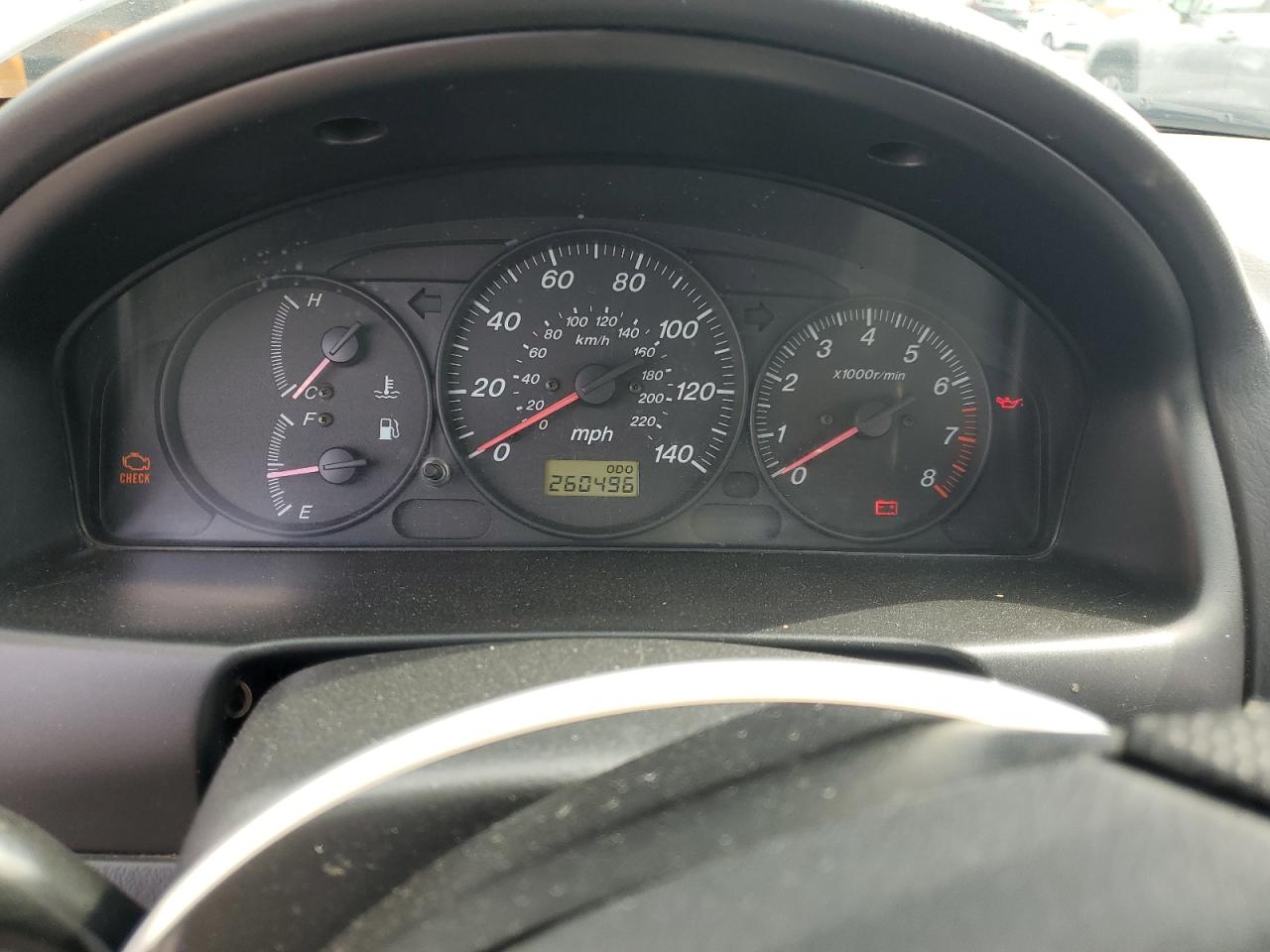 2002 Mazda Protege Dx VIN: JM1BJ225221617049 Lot: 82103005