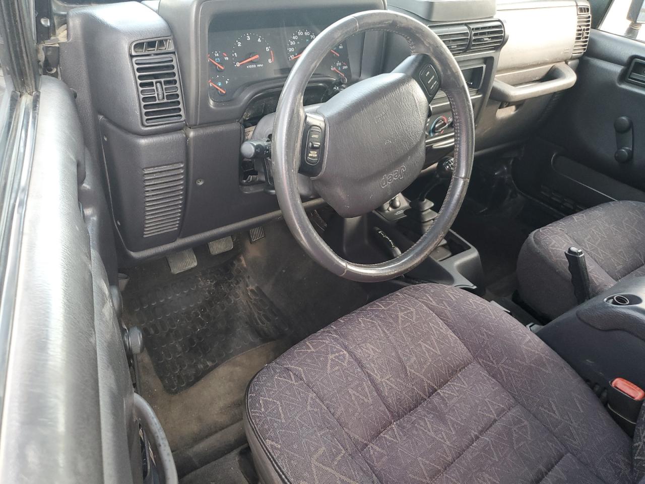 2002 Jeep Wrangler / Tj Sport VIN: 1J4FA49S22P715529 Lot: 80557755