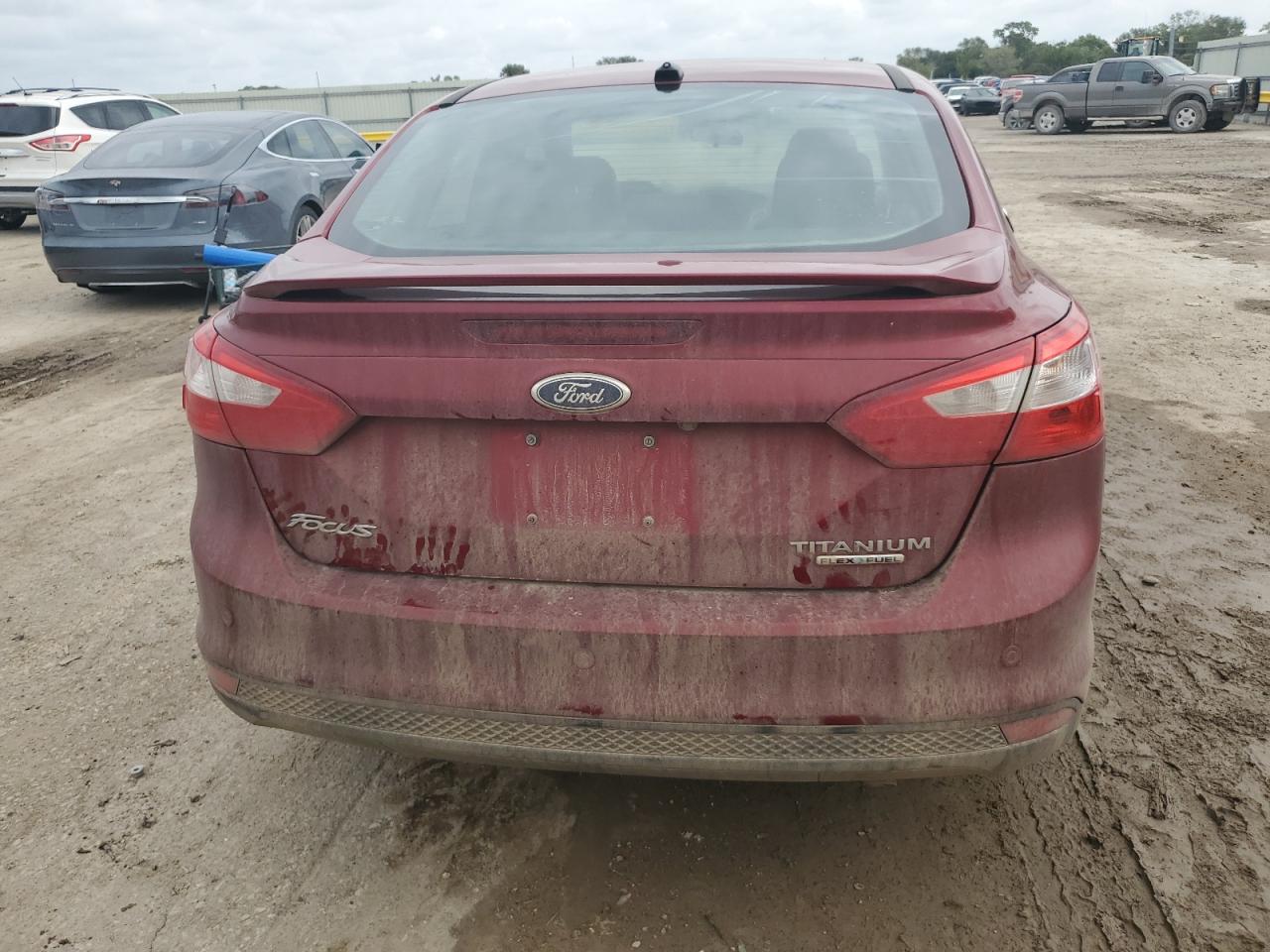 2014 Ford Focus Titanium VIN: 1FADP3J28EL431275 Lot: 83947635