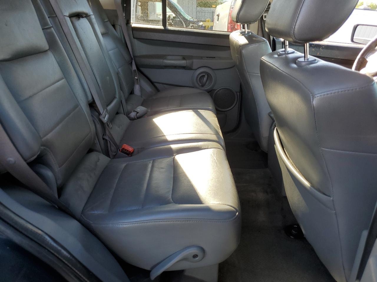 2007 Jeep Commander VIN: 1J8HG48K77C661568 Lot: 71834435