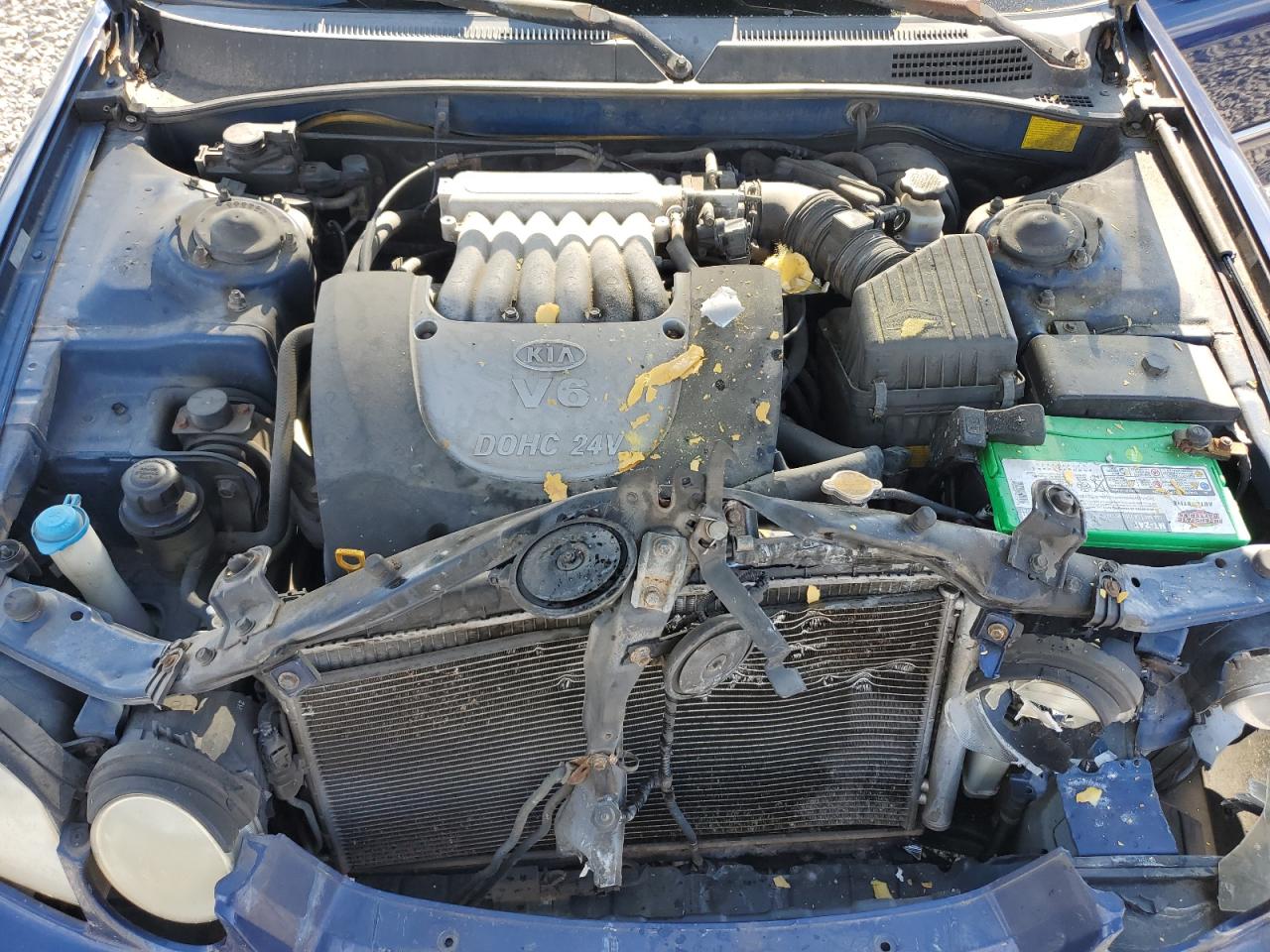 2004 Kia Optima Lx VIN: KNAGD128X45371409 Lot: 82149775