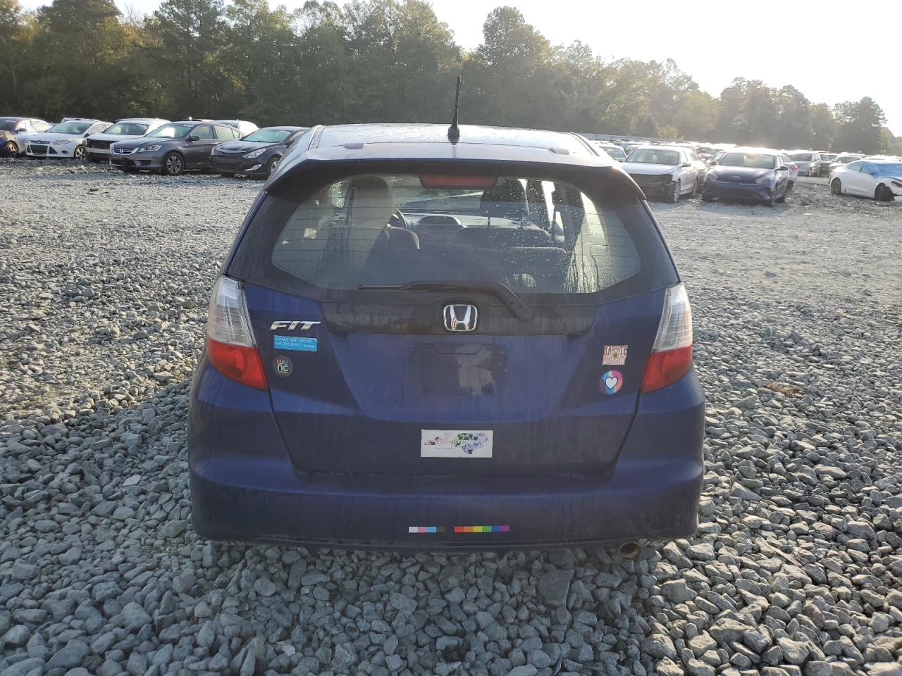 2009 Honda Fit Sport VIN: JHMGE88419S001079 Lot: 83867475