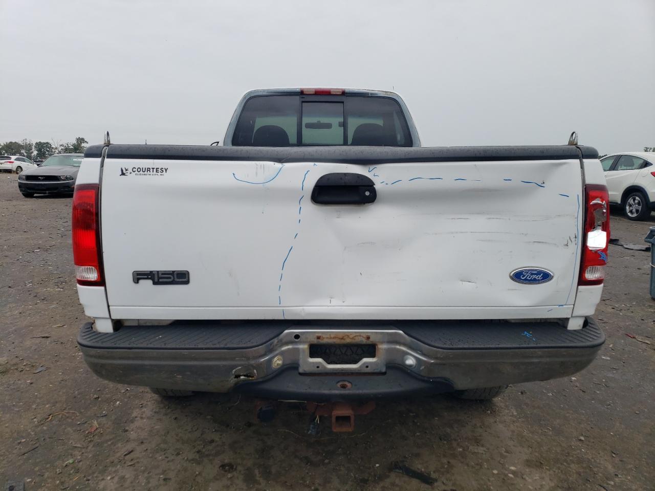 1997 Ford F150 VIN: 1FTDF18W7VNA61256 Lot: 83851825