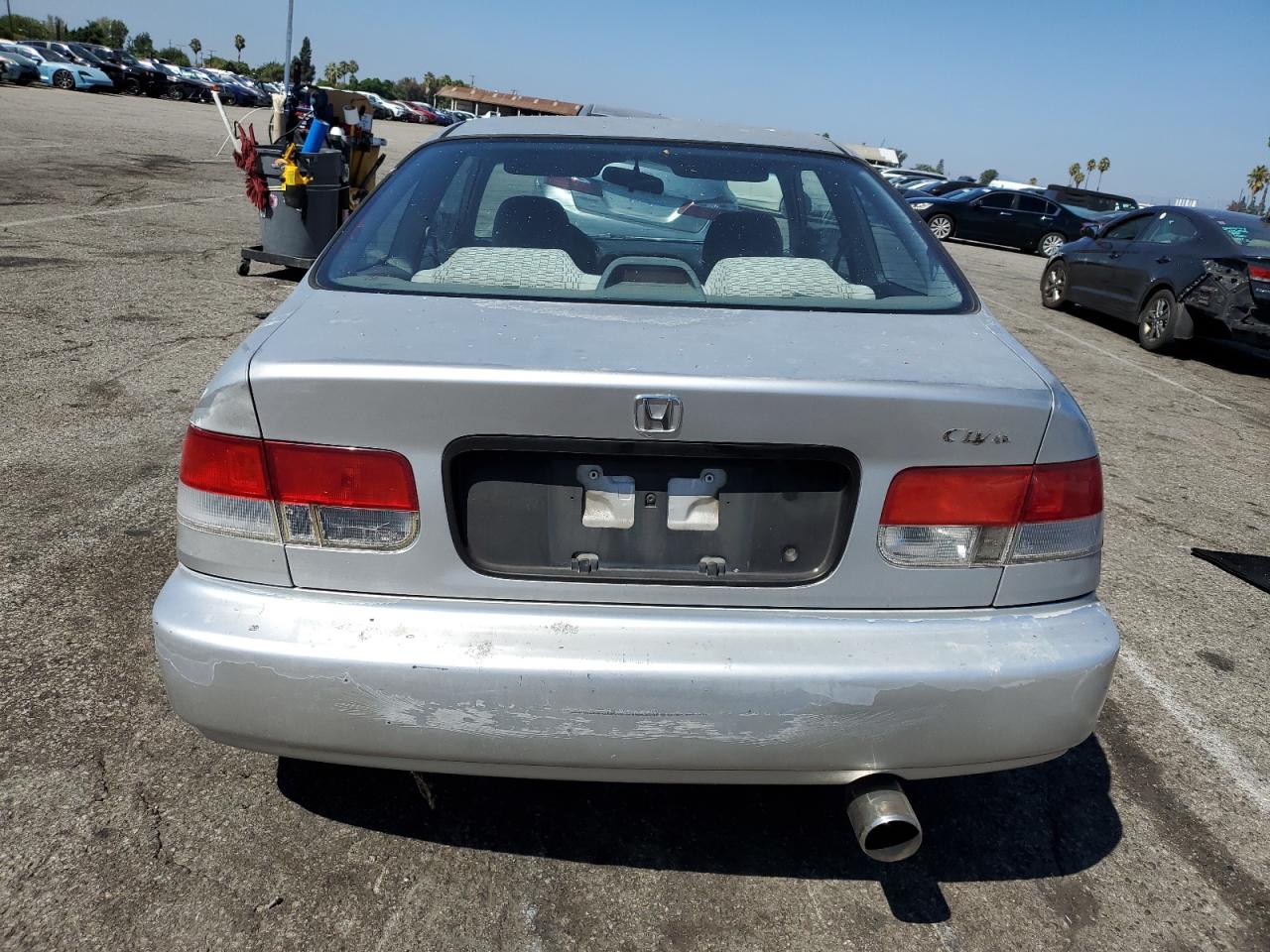 1999 Honda Civic Dx VIN: 1HGEJ6129XL028296 Lot: 80189875