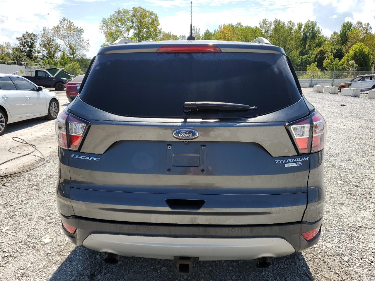 2017 Ford Escape Titanium VIN: 1FMCU9J93HUD56980 Lot: 71029035