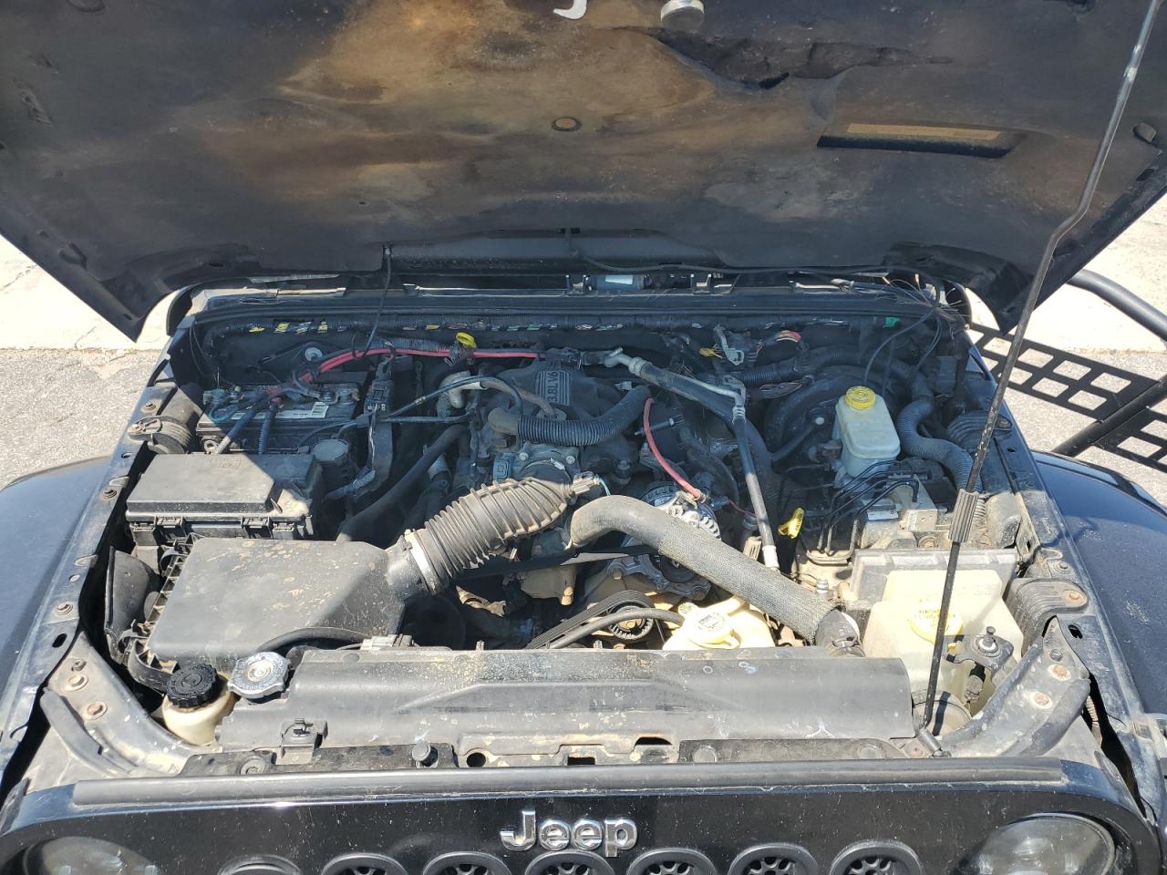 2011 Jeep Wrangler Unlimited Sahara VIN: 1J4HA5H13BL619987 Lot: 71265605