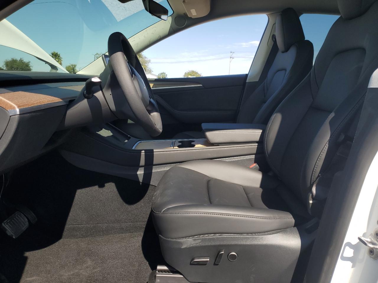 2023 Tesla Model Y VIN: 7SAYGAEEXPF781214 Lot: 83774475