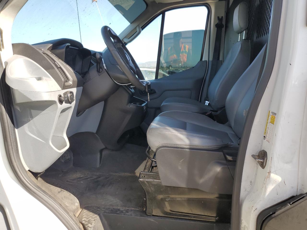 2015 Ford Transit T-150 VIN: 1FTNE2CM2FKA49764 Lot: 71306575