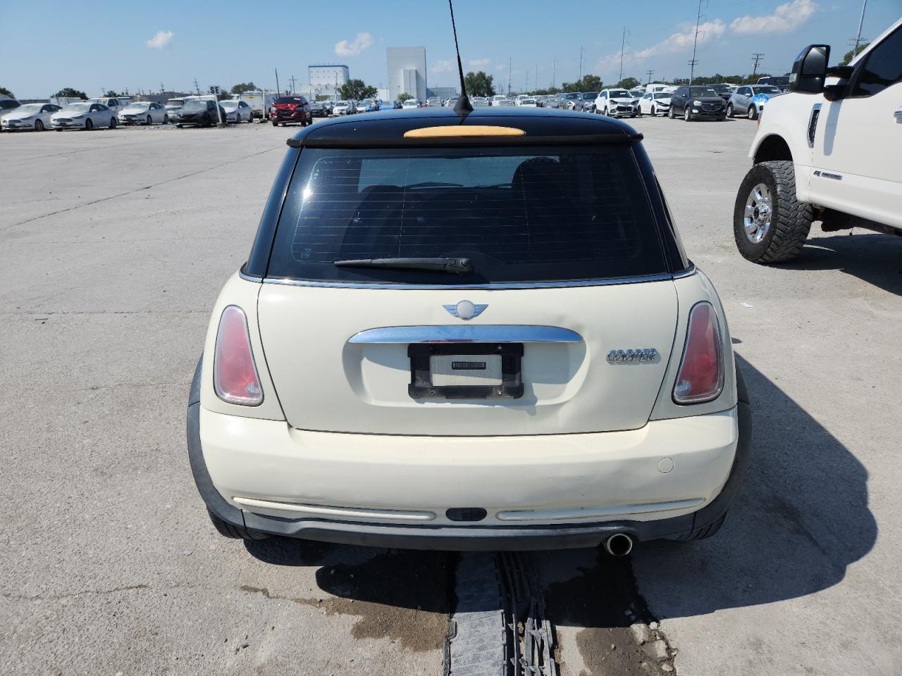 2006 Mini Cooper VIN: WMWRC33556TJ77431 Lot: 80389785
