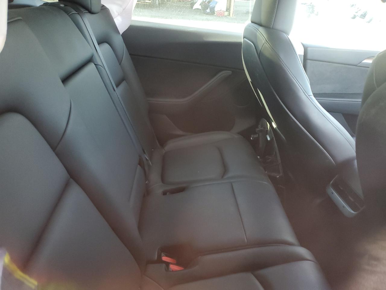 2024 Tesla Model Y VIN: 7SAYGAEE4RF125173 Lot: 80579585