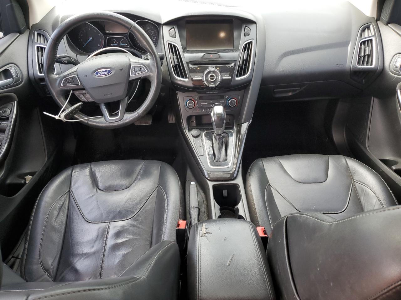 2018 Ford Focus Titanium VIN: 1FADP3J21JL250058 Lot: 83813475