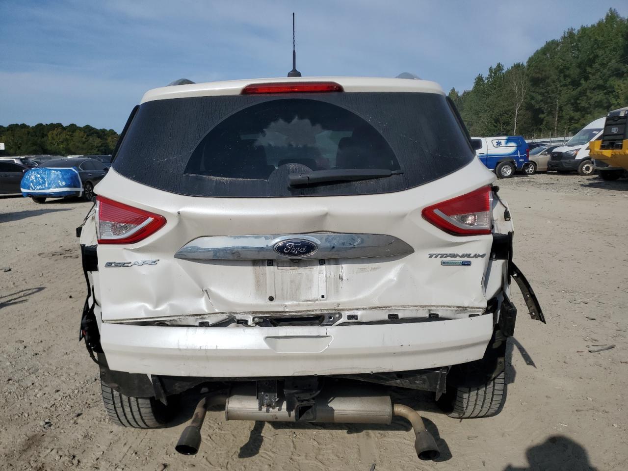 2016 Ford Escape Titanium VIN: 1FMCU9J9XGUA61521 Lot: 81739425